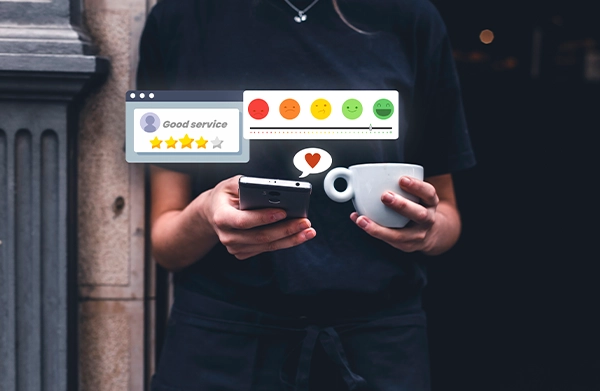 Persona sosteniendo un dispositivo móvil con indicadores de valoración emocional y métricas visuales para redes sociales.